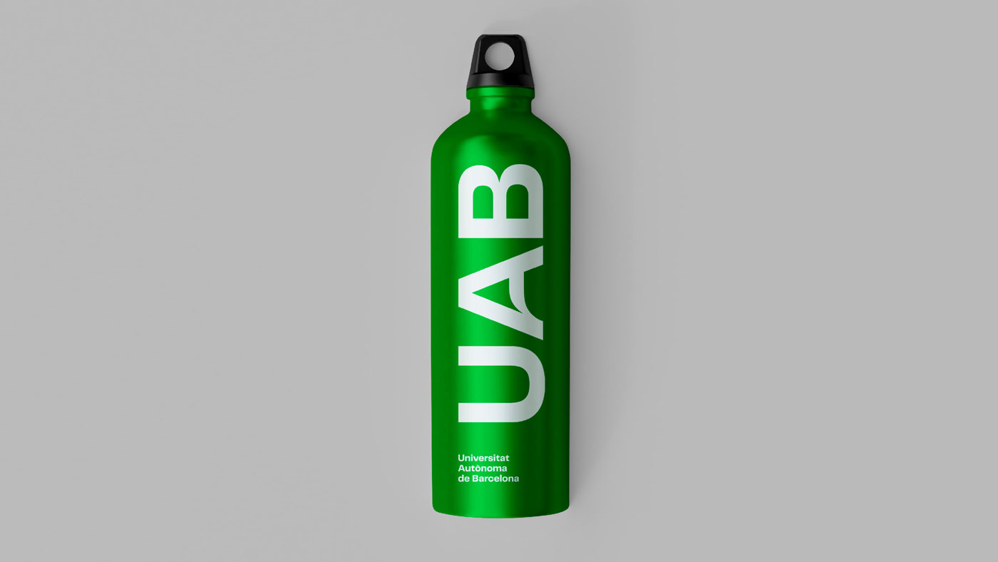 Ampolla tinta blanca sobre fons verd UAB marxandatge